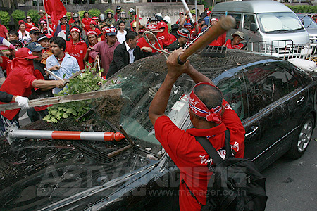 Red Shirts destroy car